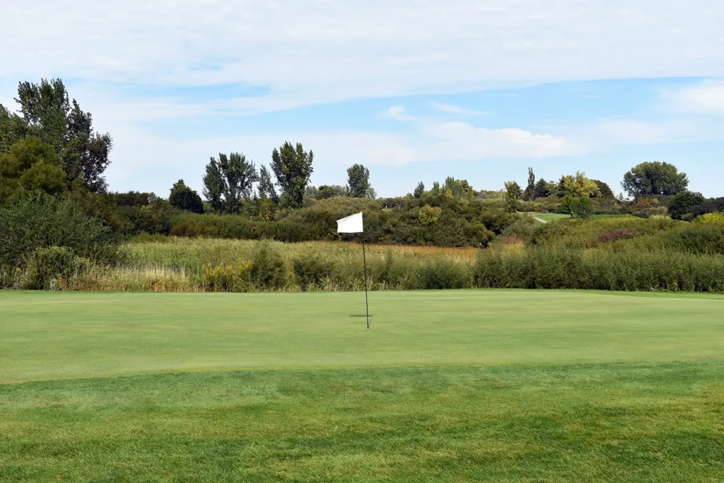 golf green with white flag at Lakeside Links, Ludington, MI